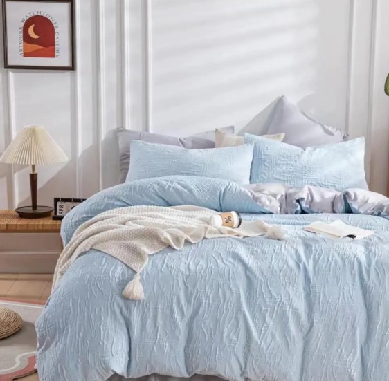 Qual estilo de quarto é mais adequado para um conjunto de capa de edredom de estilo moderno com textura Nadine e cor sólida?